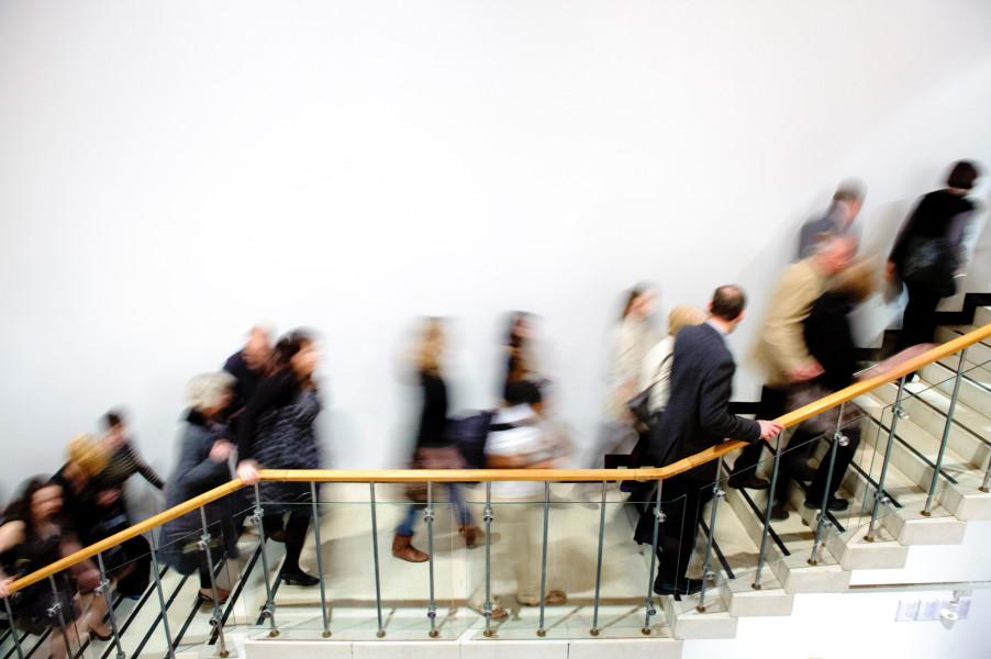 Image of Blurred crowd climbing stairs
