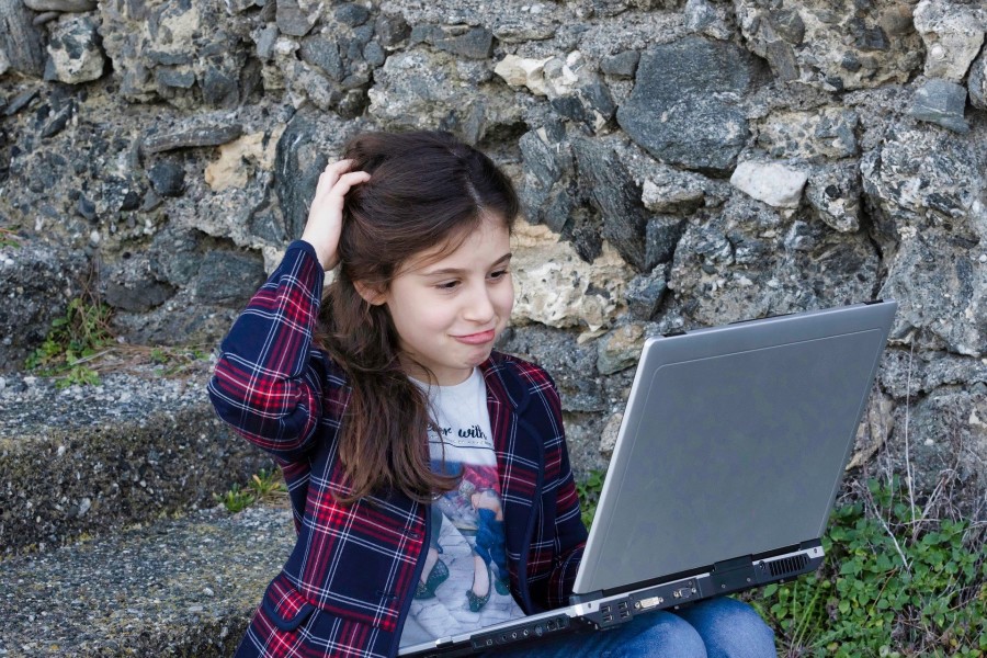 Image of Girl on Laptop Computer Outside.jpg