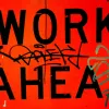 words "WORK AHEAD" displayed on a red background covered in colourful graffiti